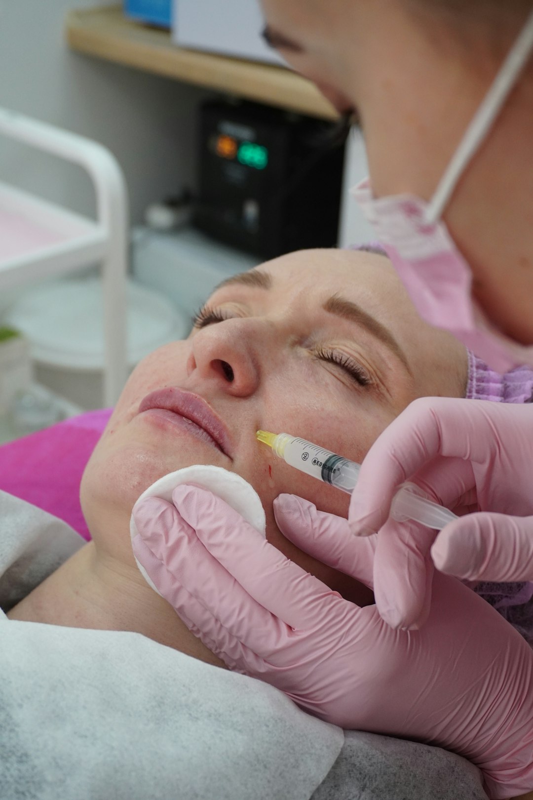a-woman-getting-her-teeth-checked-by-a-dentist-y37xrurmhcq